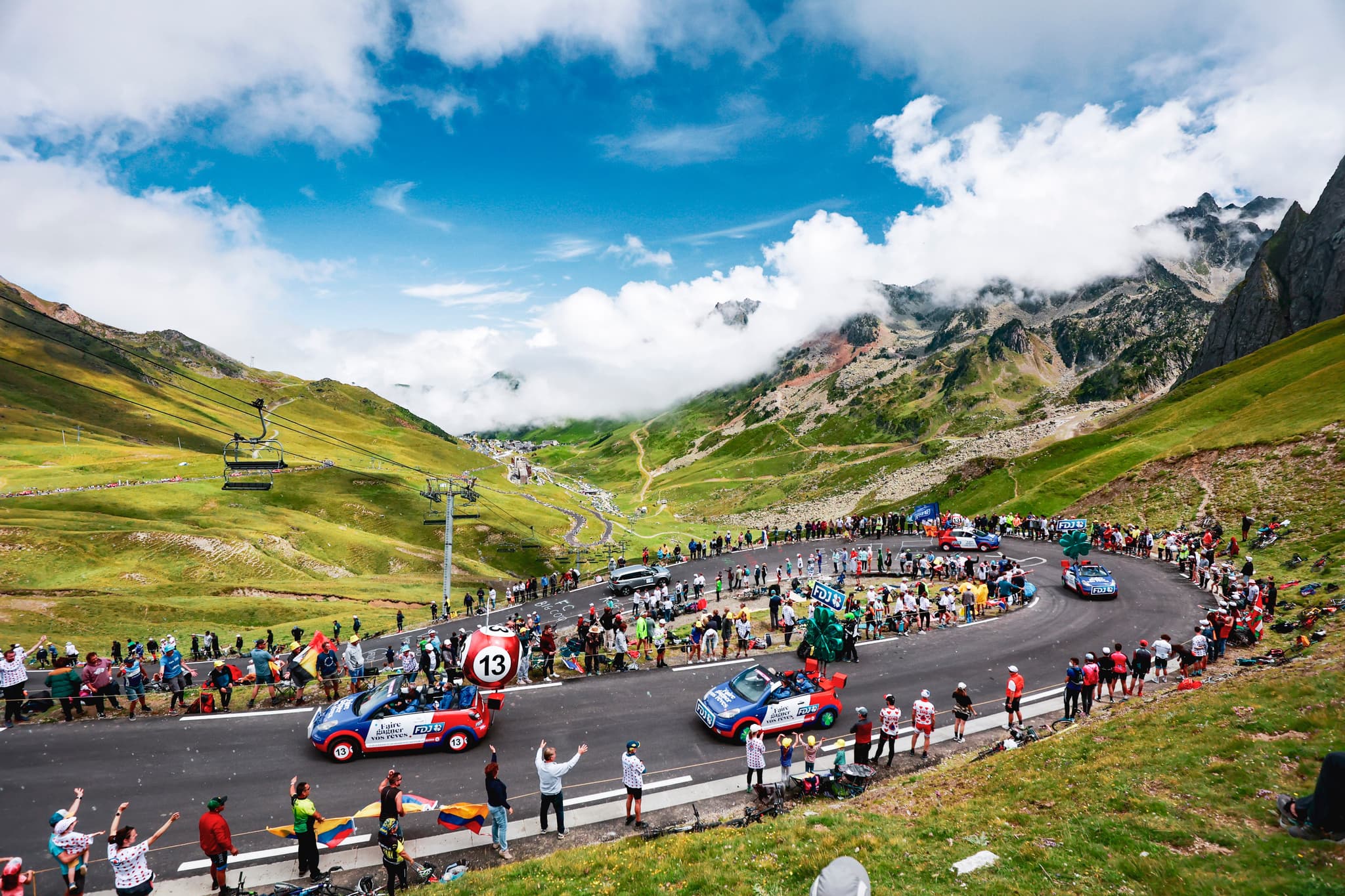 Tour de France caravan on mountain road, Aurelien Vialatte/A.S.O.
