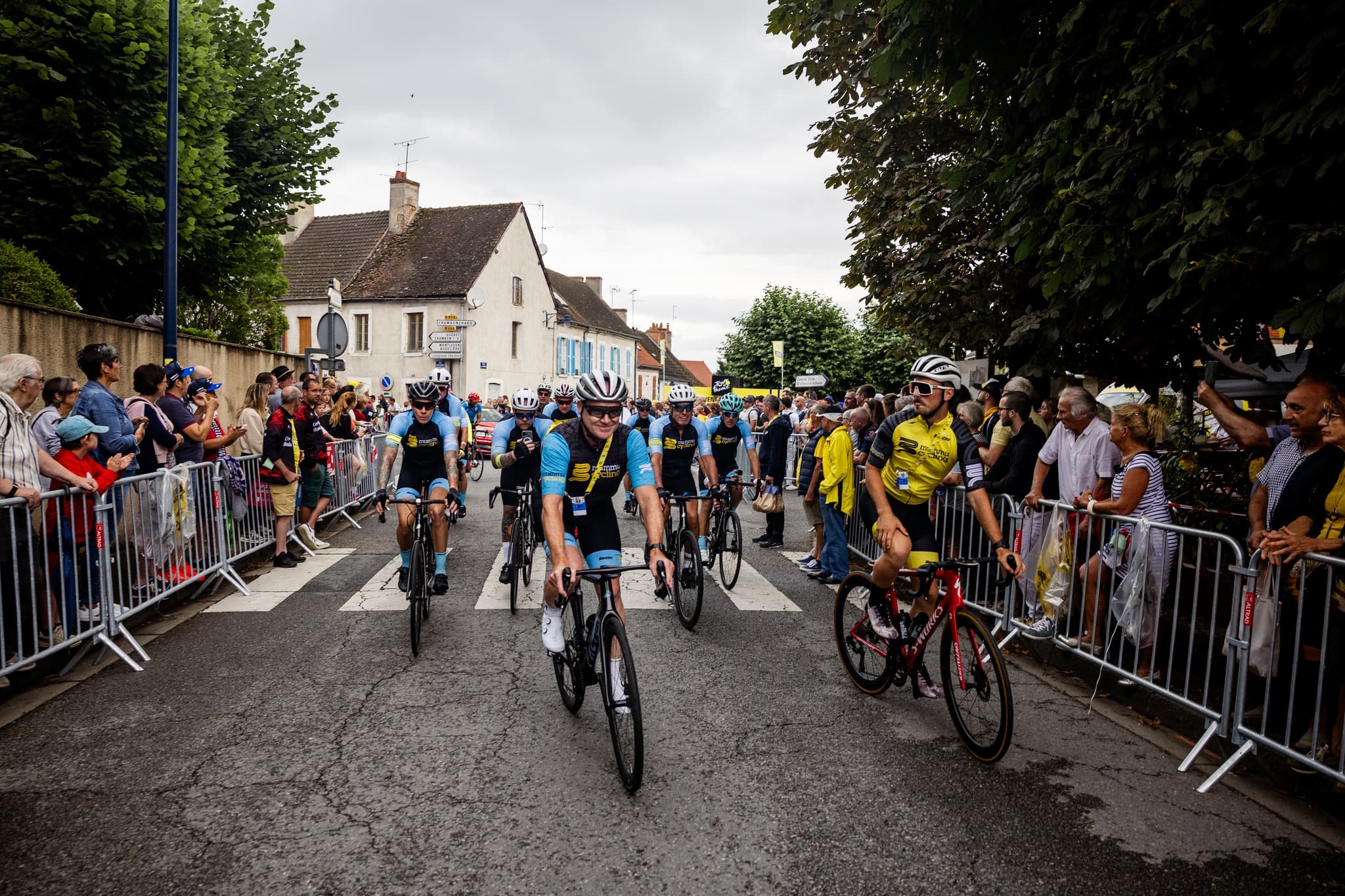 Cyclists on road, Tour de France 2024, Mummu Cycling guests