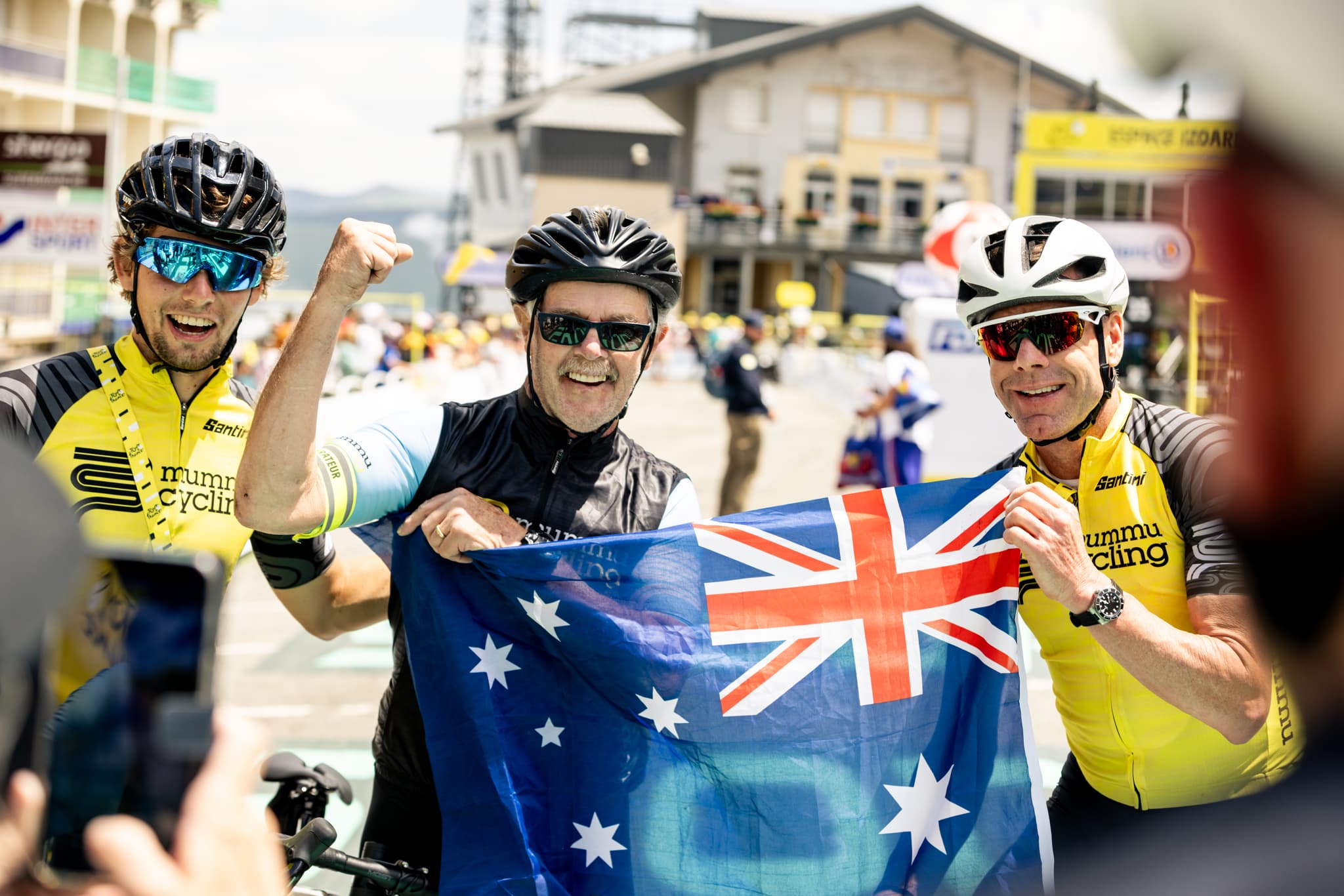 Mummu Cycling guests celebrate with Australian flag, TDF 2024