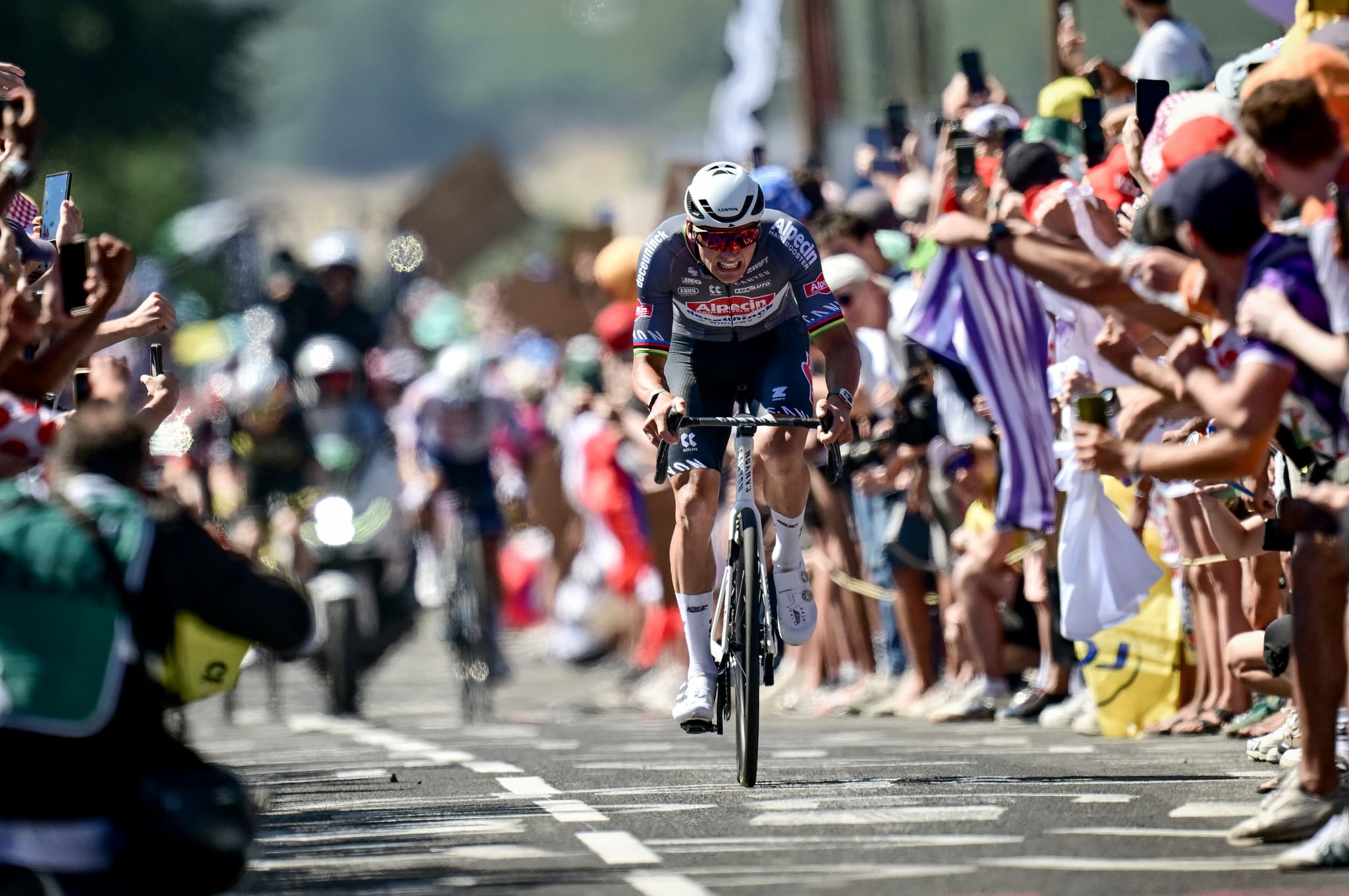 Alpecin-Deceuninck rider on the attack, Tour de France 2030