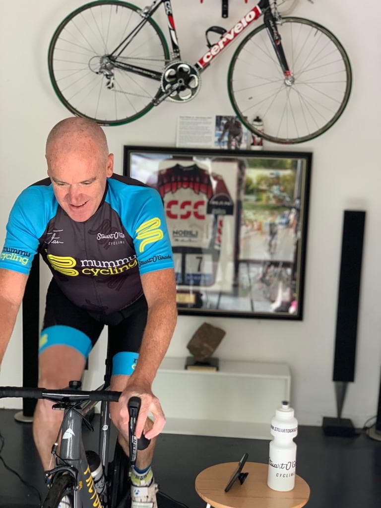 Stuart O'Grady rides indoors in Mummu Cycling kit