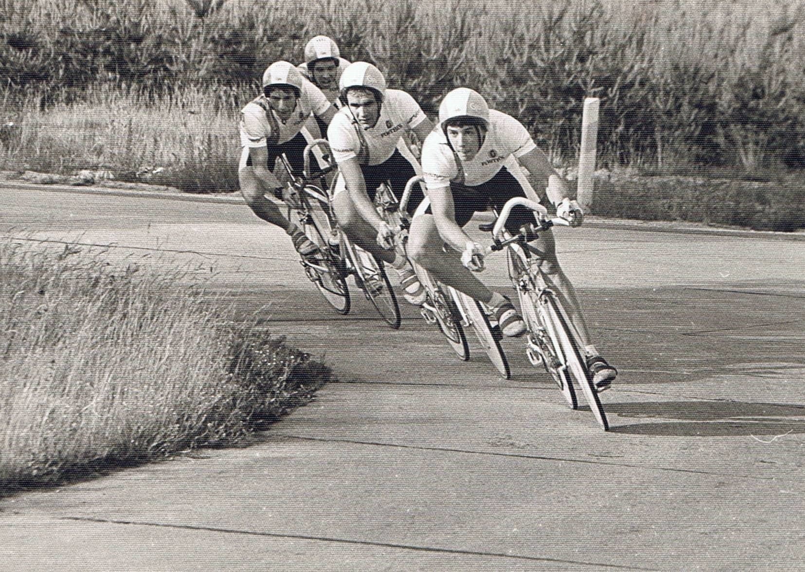Cyclists in vintage Pentax team kit, black and white image.