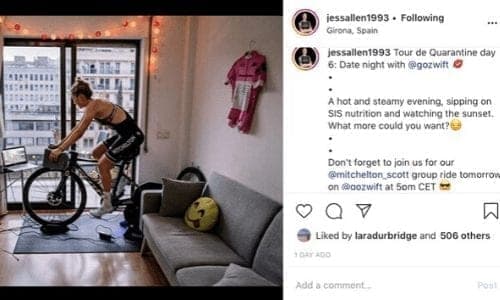 Woman cycling indoors on a trainer, 'Tour de Quarantine'