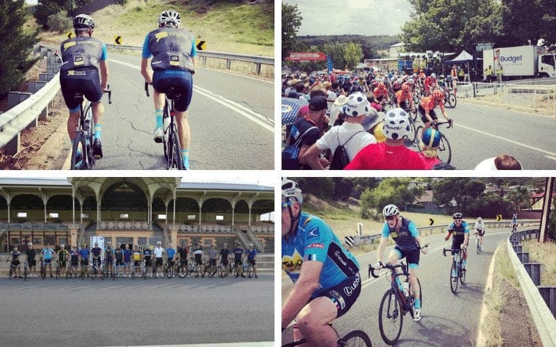Cyclists on road, group photo at building