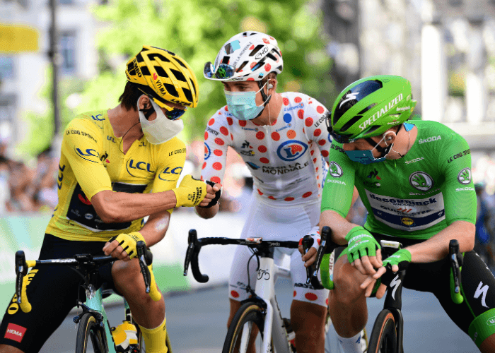 Cyclists in leader jerseys: Yellow, Polka Dot, Green