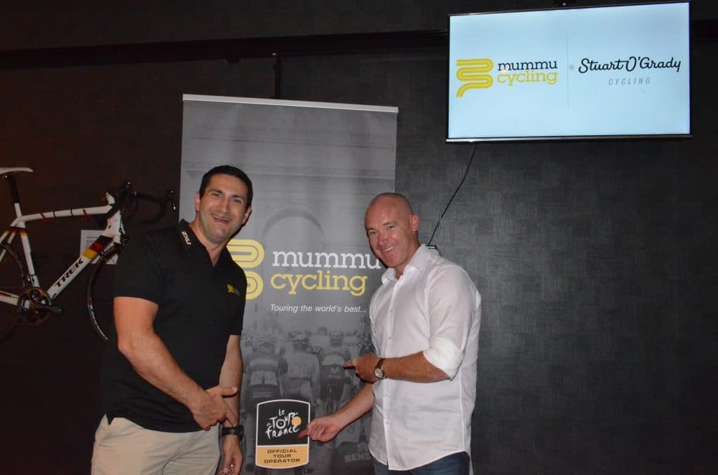 Stuart O'Grady with Mummu Cycling representative